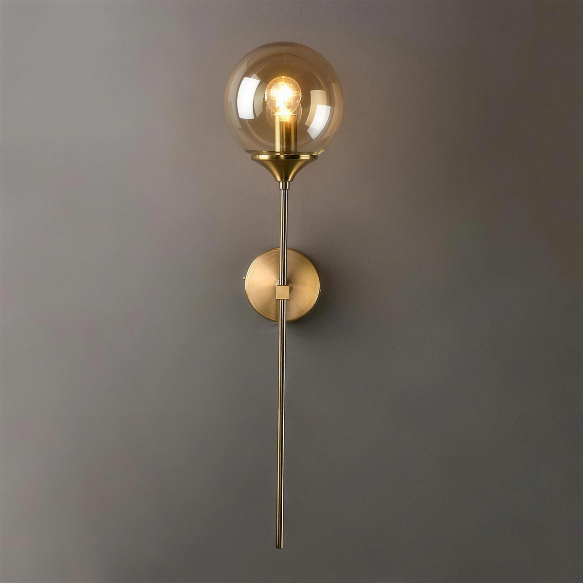 Marlow Style A gold wall light with clear globe - Hestia + Co.