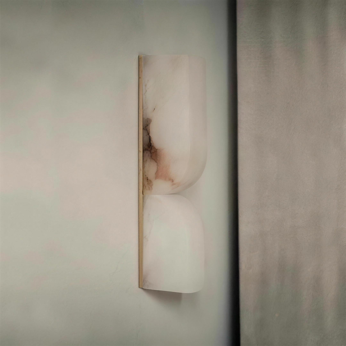 Ronda marble wall light switched off on a plaster wall - Hestia + Co.